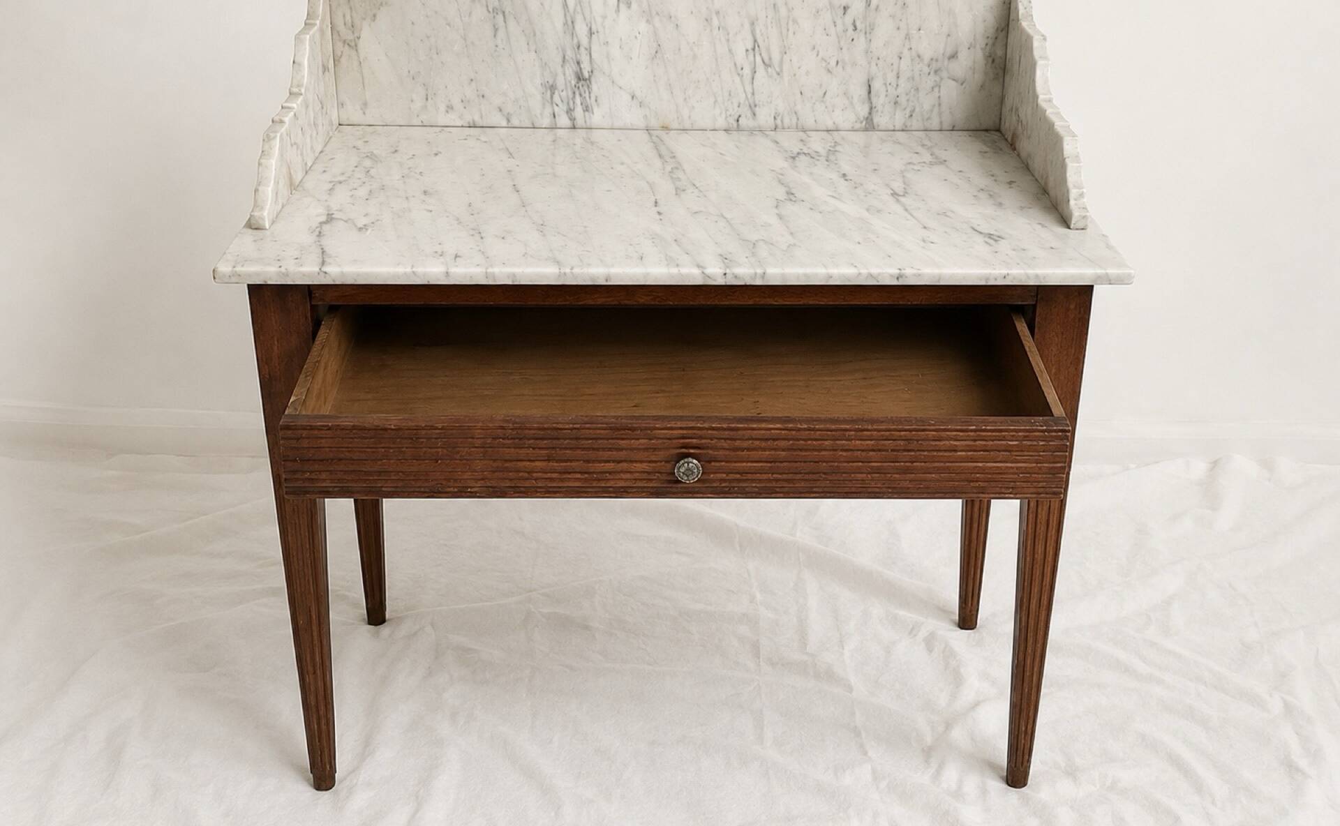 Antique wooden and veined white marble dresser, Louis XVI style.