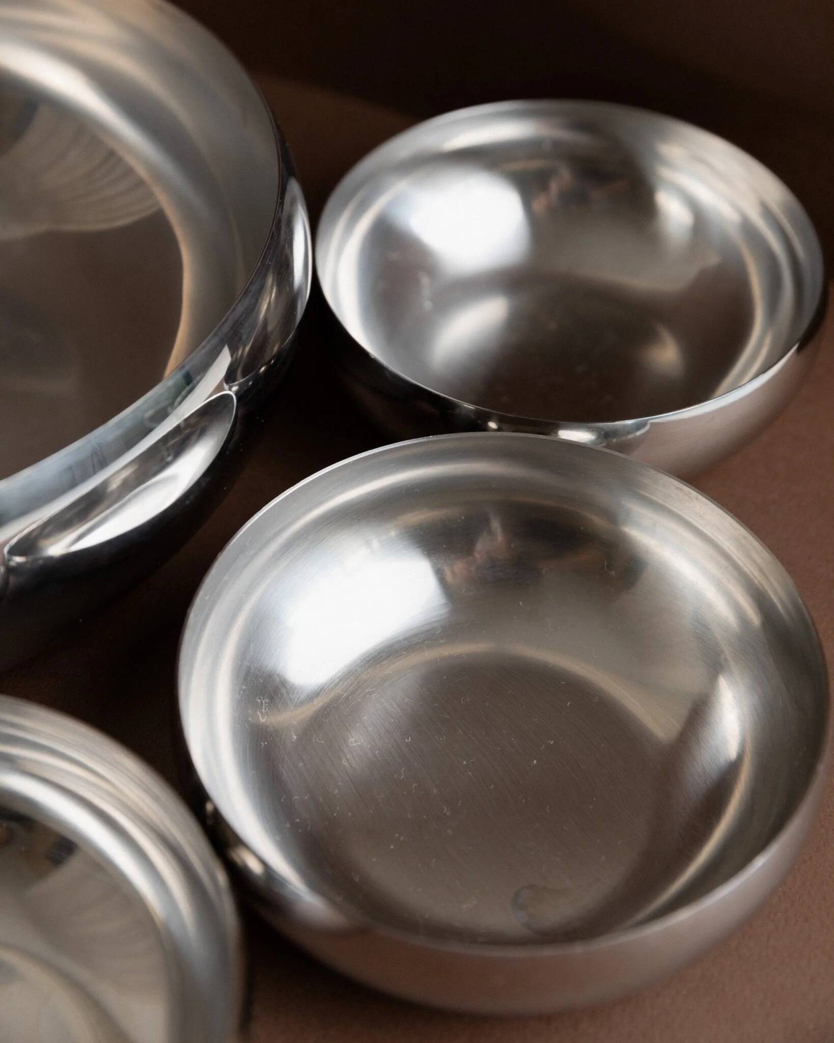 Set of 7 silver stainless steel bowls Space Age vintage Italian design stackable and elegant