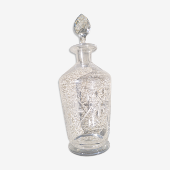 Early 20th century carafe chiseled and engraved, faceted cap