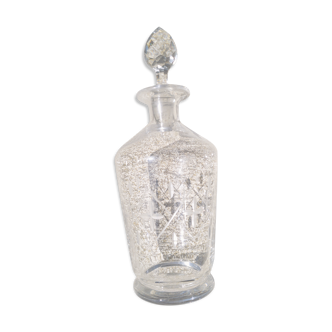 Early 20th century carafe chiseled and engraved, faceted cap