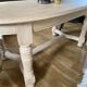 Table ovale avec rallonge intégrée