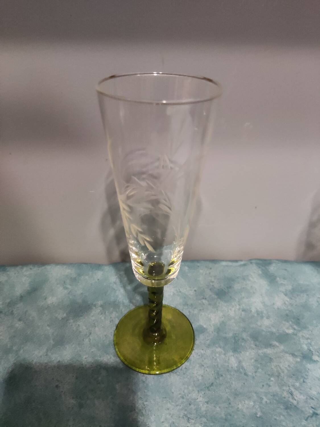 Four vintage stemmed glasses