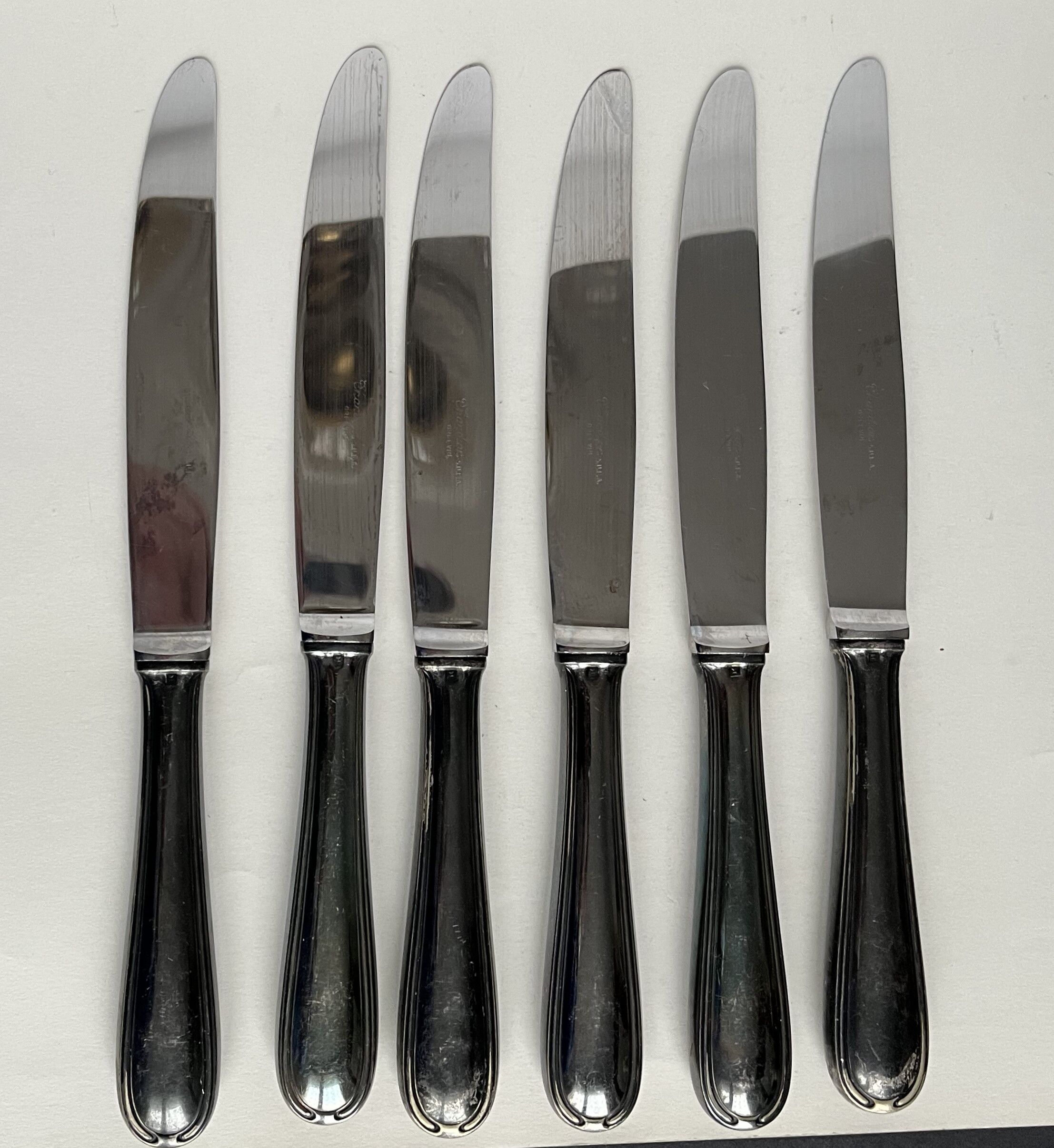 6 silver metal table knives