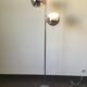 Eyeball floor lamp in chromed metal