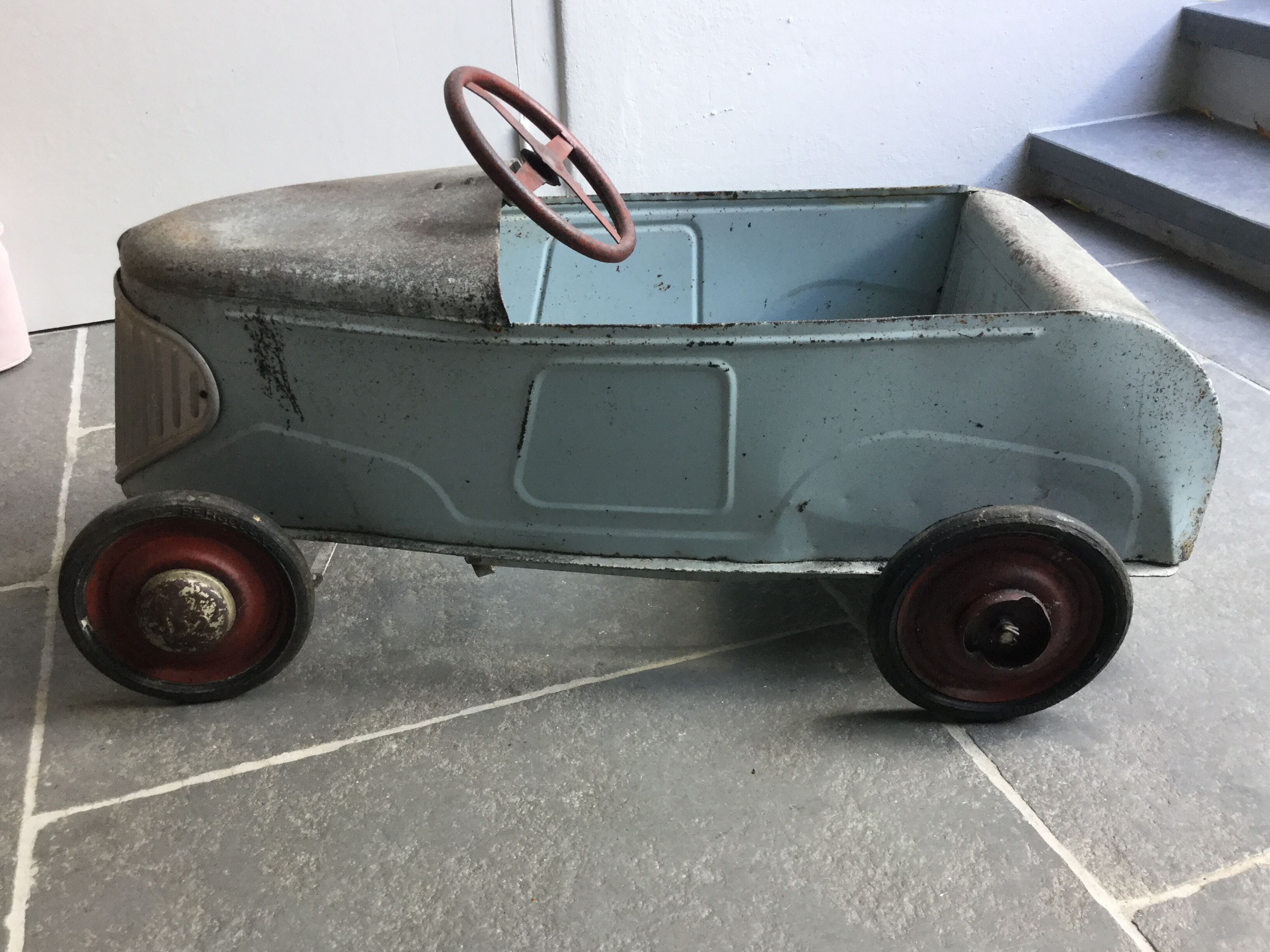 Old metal pedal car 1930