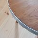 Vintage metal and teak side table from the 1950s.