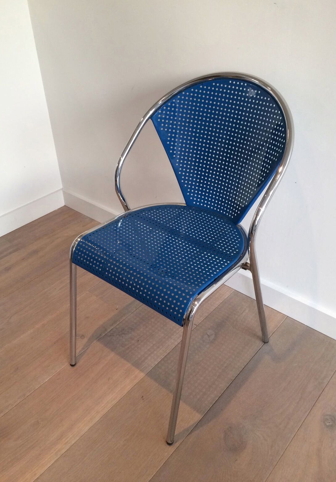 Set of 4 chairs chrome-based perforated metal blue color, around 1980