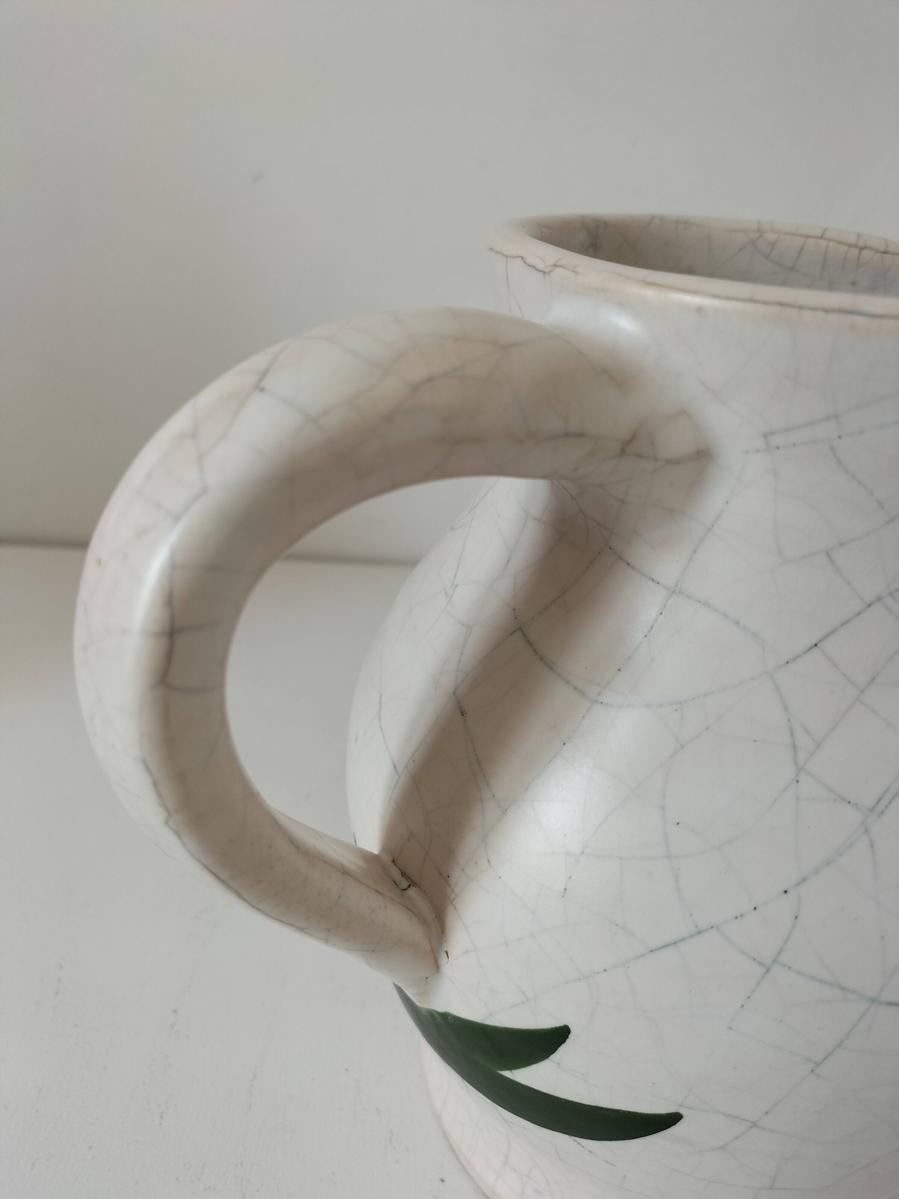 Vintage pitcher with floral decoration in the style of Poterie du Marais