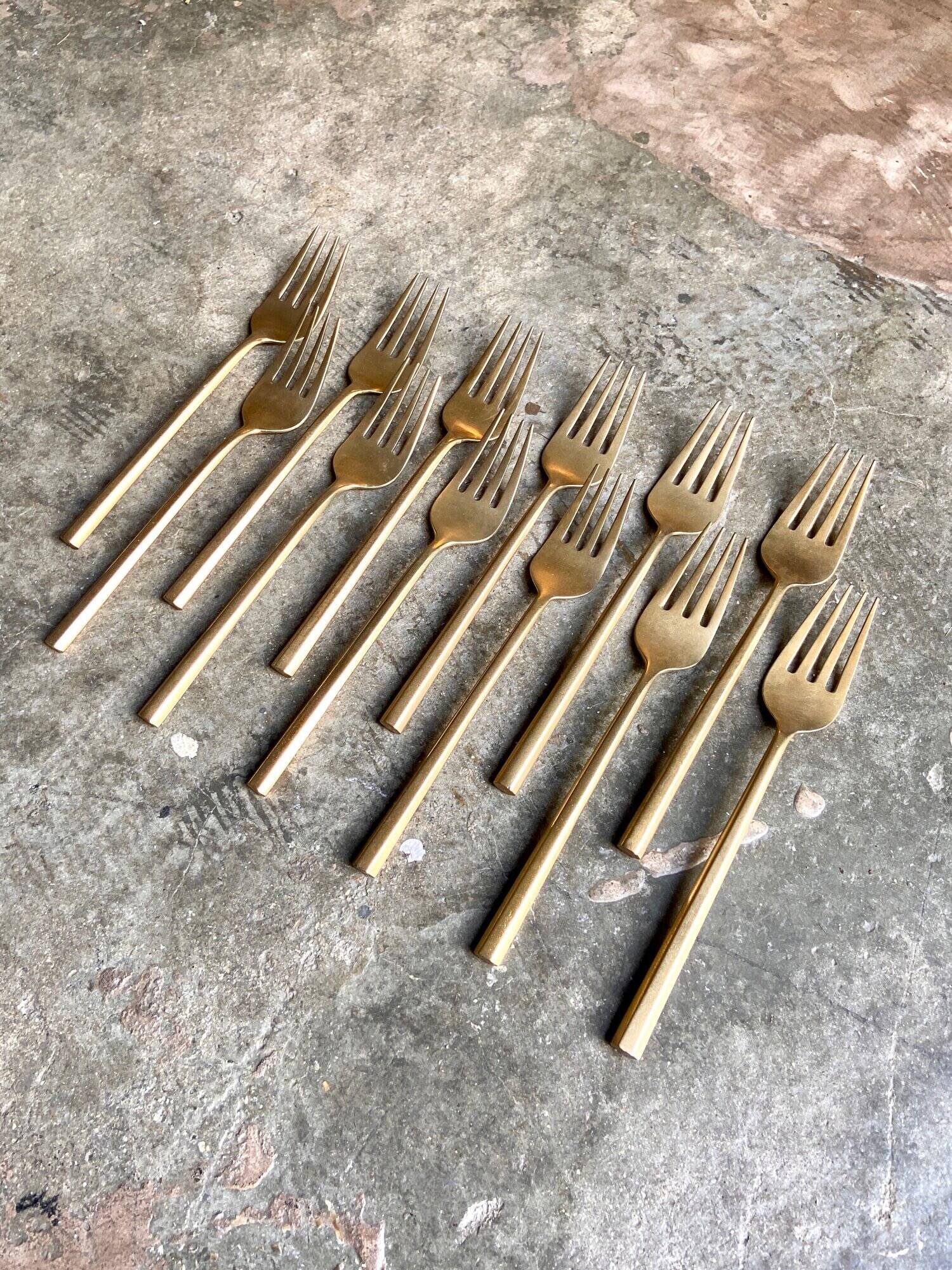 12 gilded bronze forks