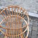 Pairs of shell rattan armchairs from the 50