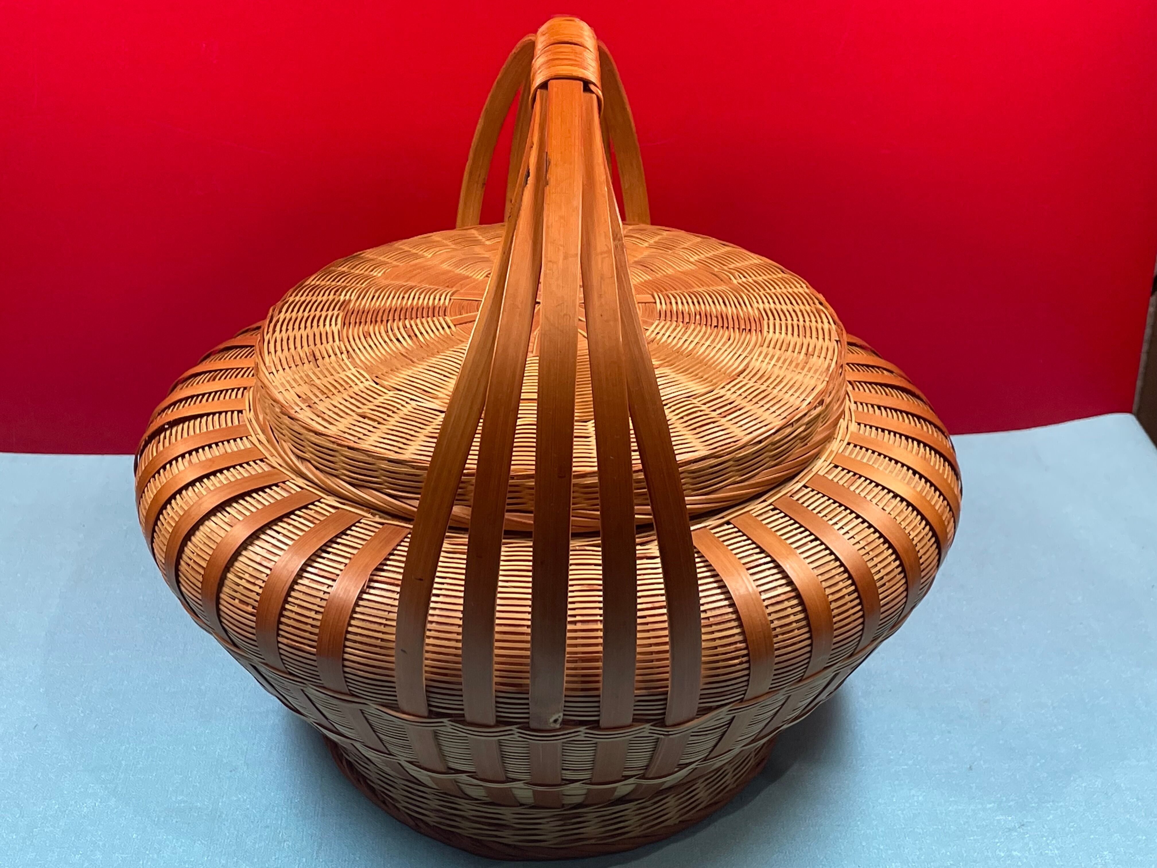 Worker vintage wicker covered basket