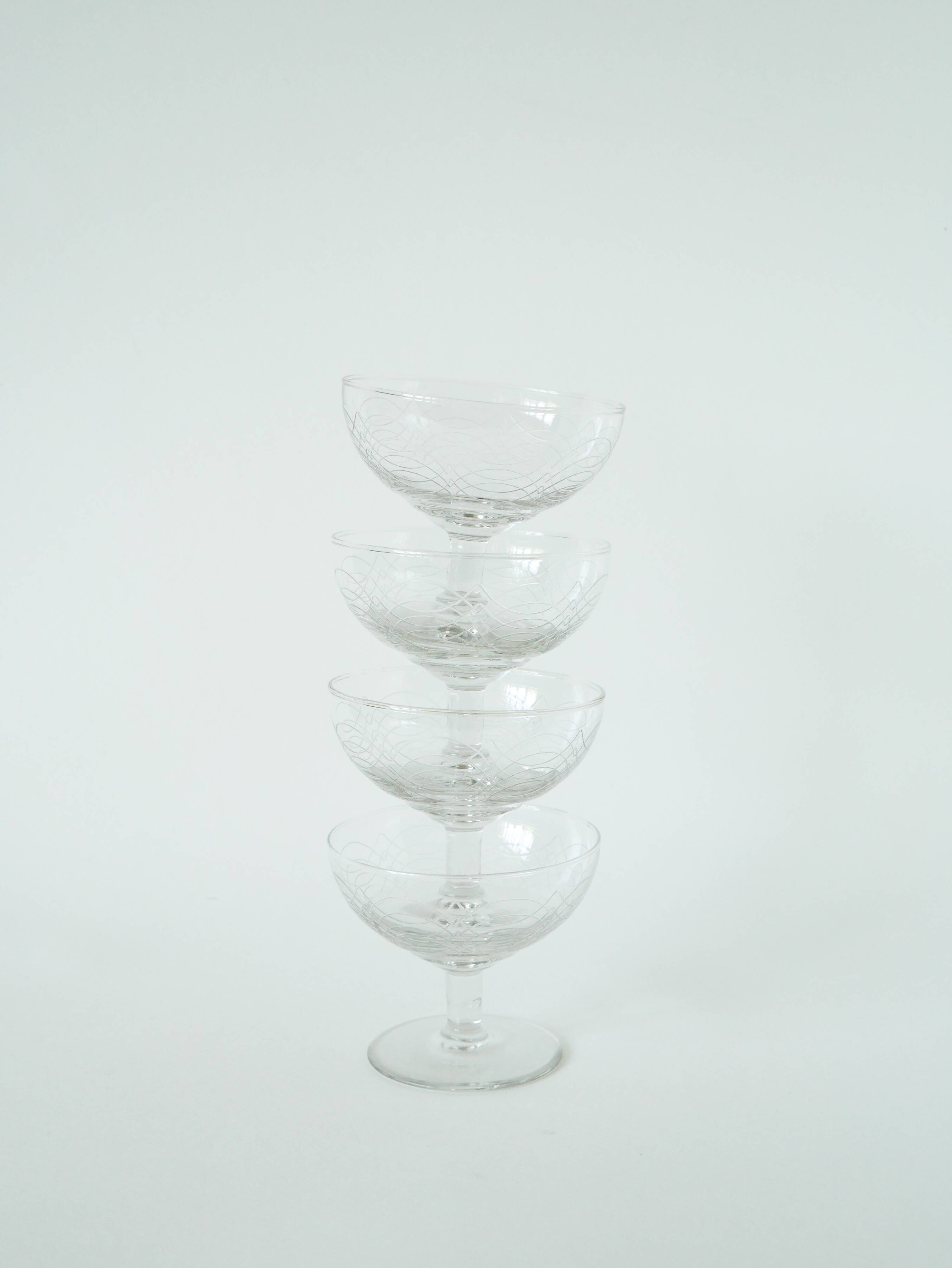 Set of 4 engraved crystal champagne glasses, arabesque motifs, 1950