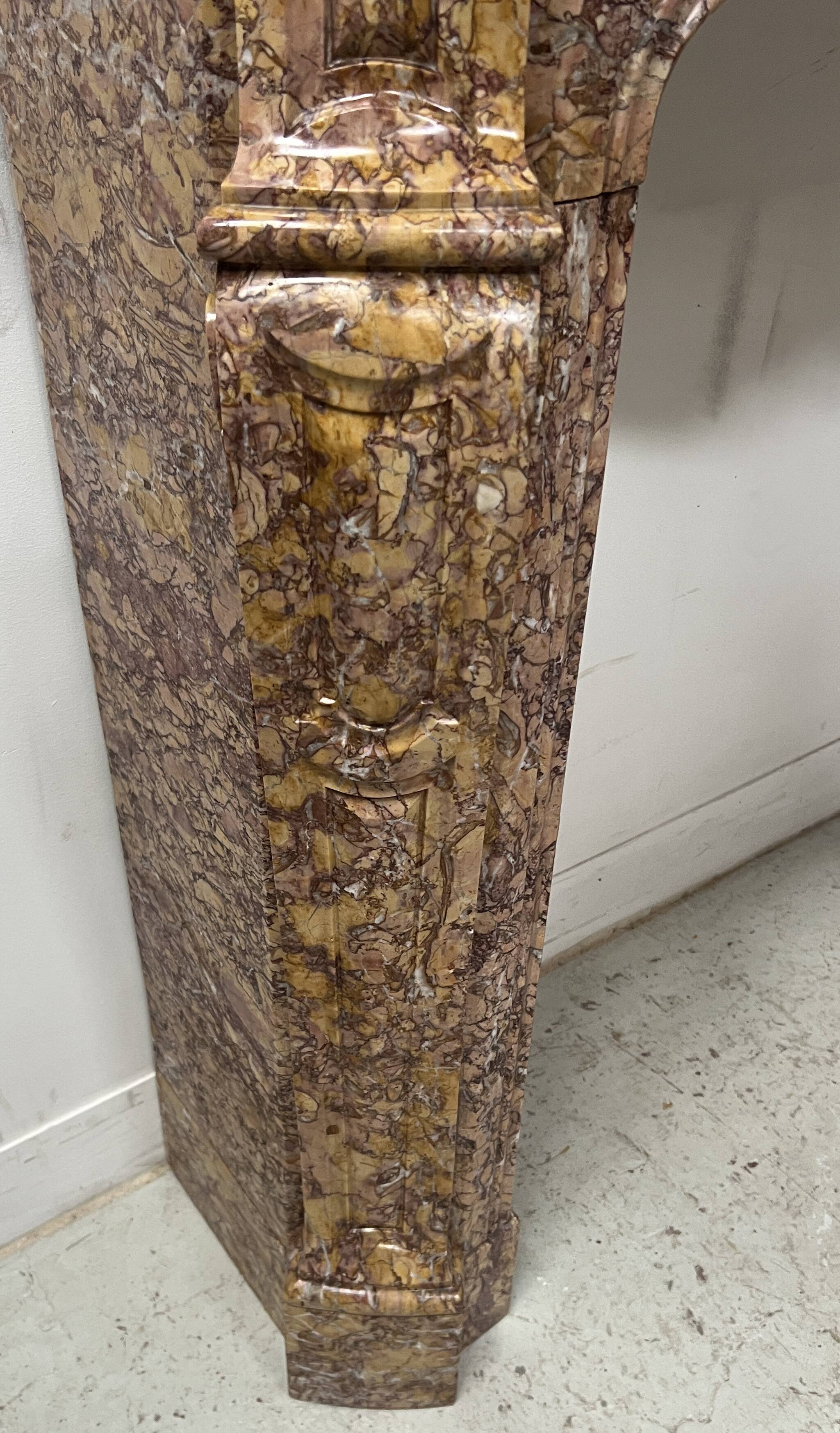 Louis XV style fireplace, Pompadour model, speckled breccia marble, 19th century