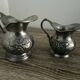 2 pewter pitchers stamped Fein Zinn
