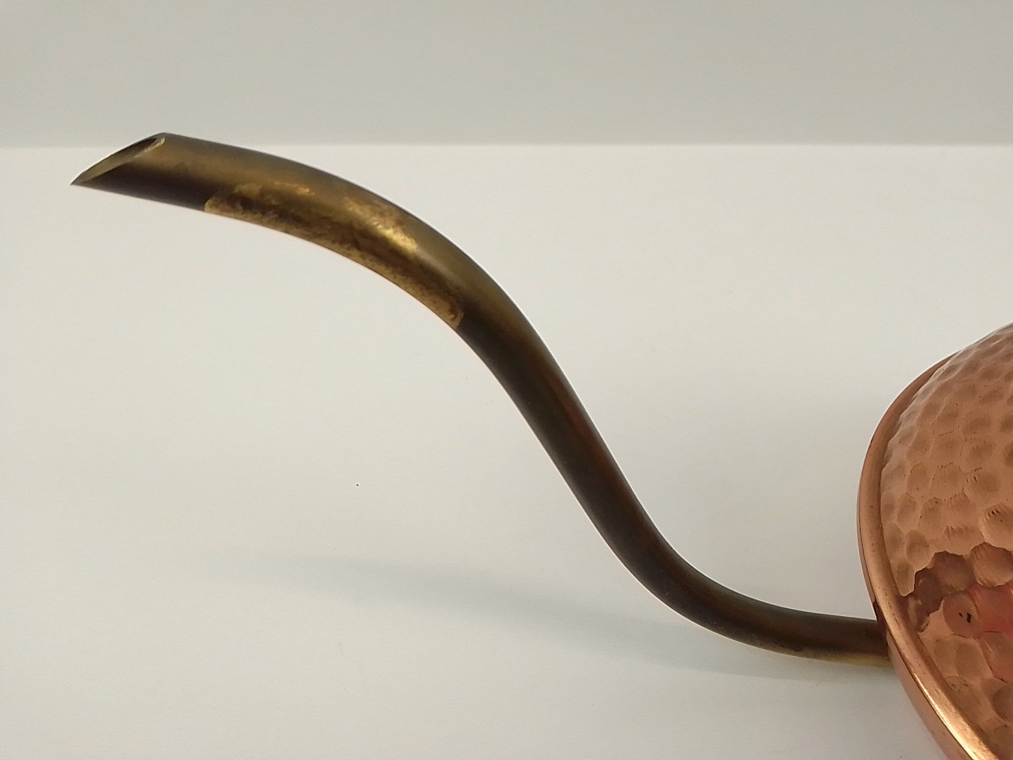 Copper and brass watering can