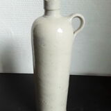 Vintage glazed stoneware bottle with handle