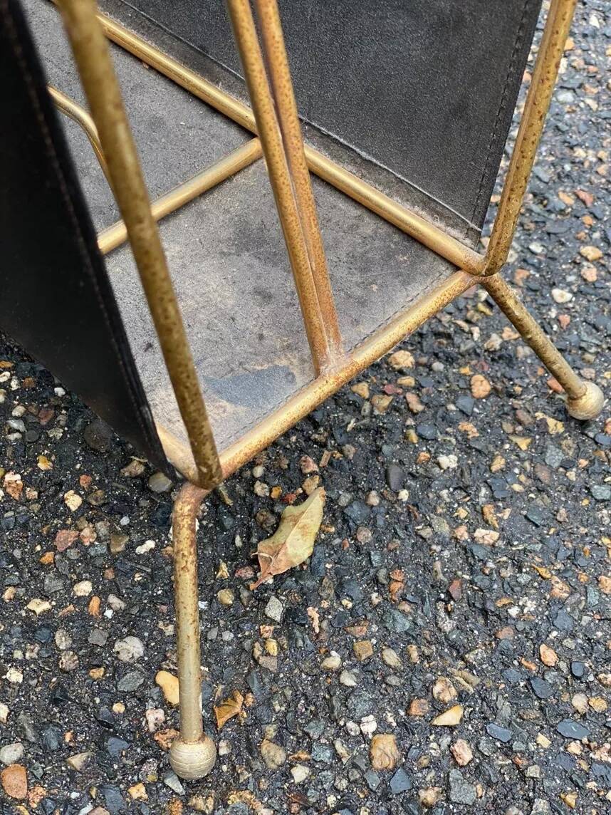 Vintage magazine rack in black leather and gold metal