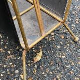 Vintage magazine rack in black leather and gold metal