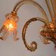 Venetian chandelier in gilded and pink Murano glass, 5 light arms, circa 1930.