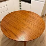 Wooden round table with butterfly extension from the 1970s.