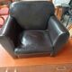 Mini black leather armchair for children
