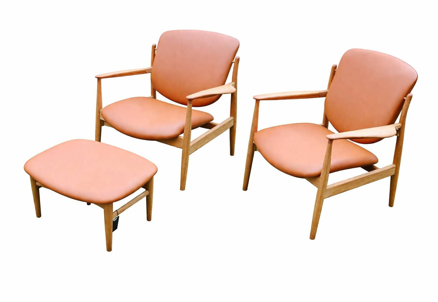 2 "The French Chair" seats by designer Finn Juhl and 1 matching footrest.