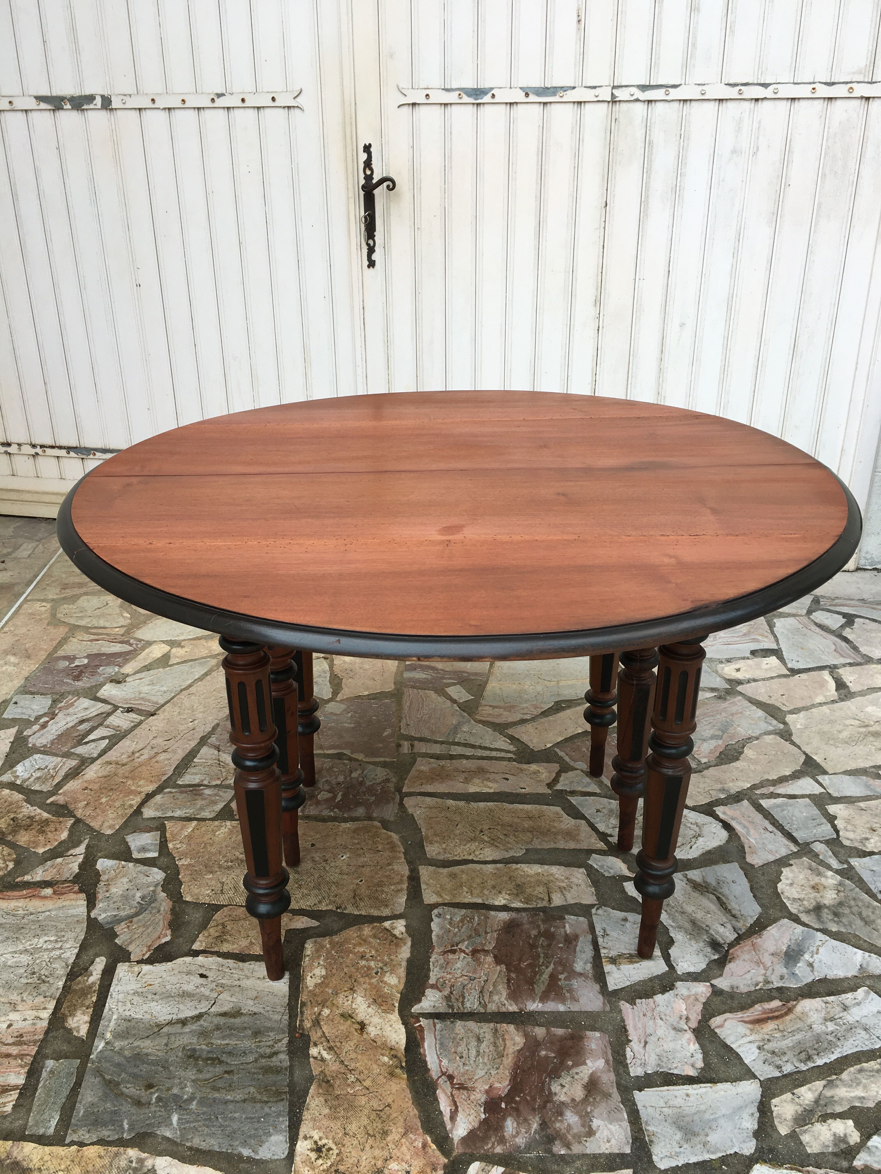 Round table 6 feet with solid mahogany extensions