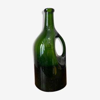 Bottle in olive glass