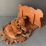 Black Forest carved wooden wall console, harness with wolf decoration