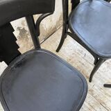 Set of 7 black bistro chairs