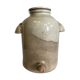 Old vinaigrier in sandstone vintage pot