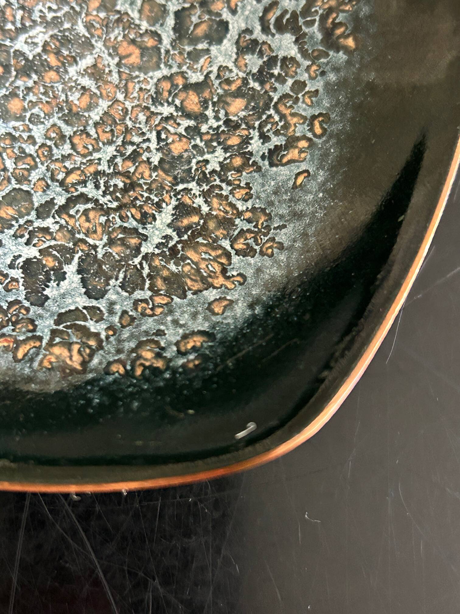 Expertic enamelled brass pocket emptier