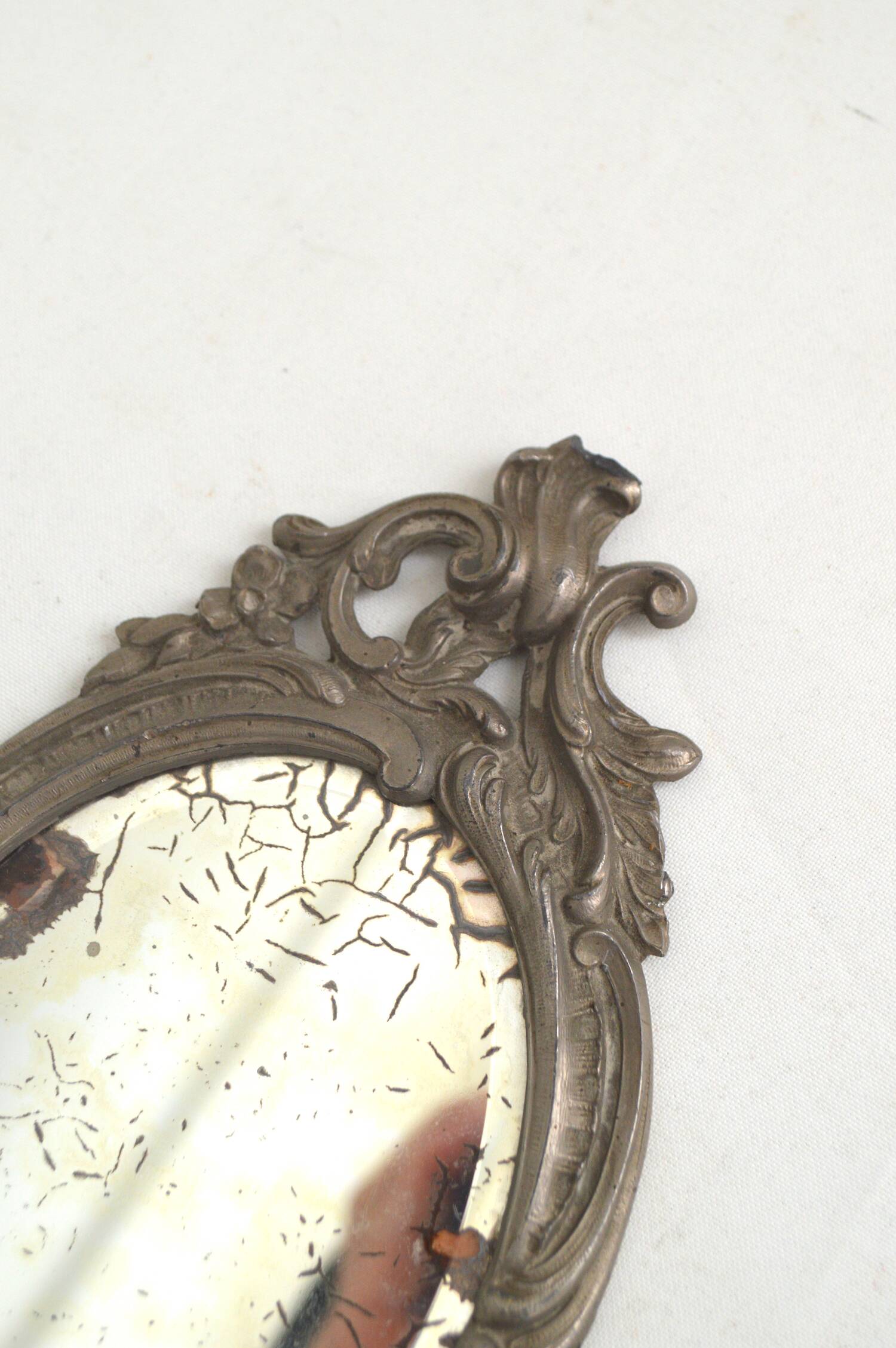 Pewter hand mirror