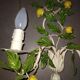 Wire wall lamp decorated with lemons