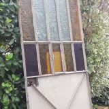 Workshop door 258,4x98,5cm in iron and colored cathedral glasses