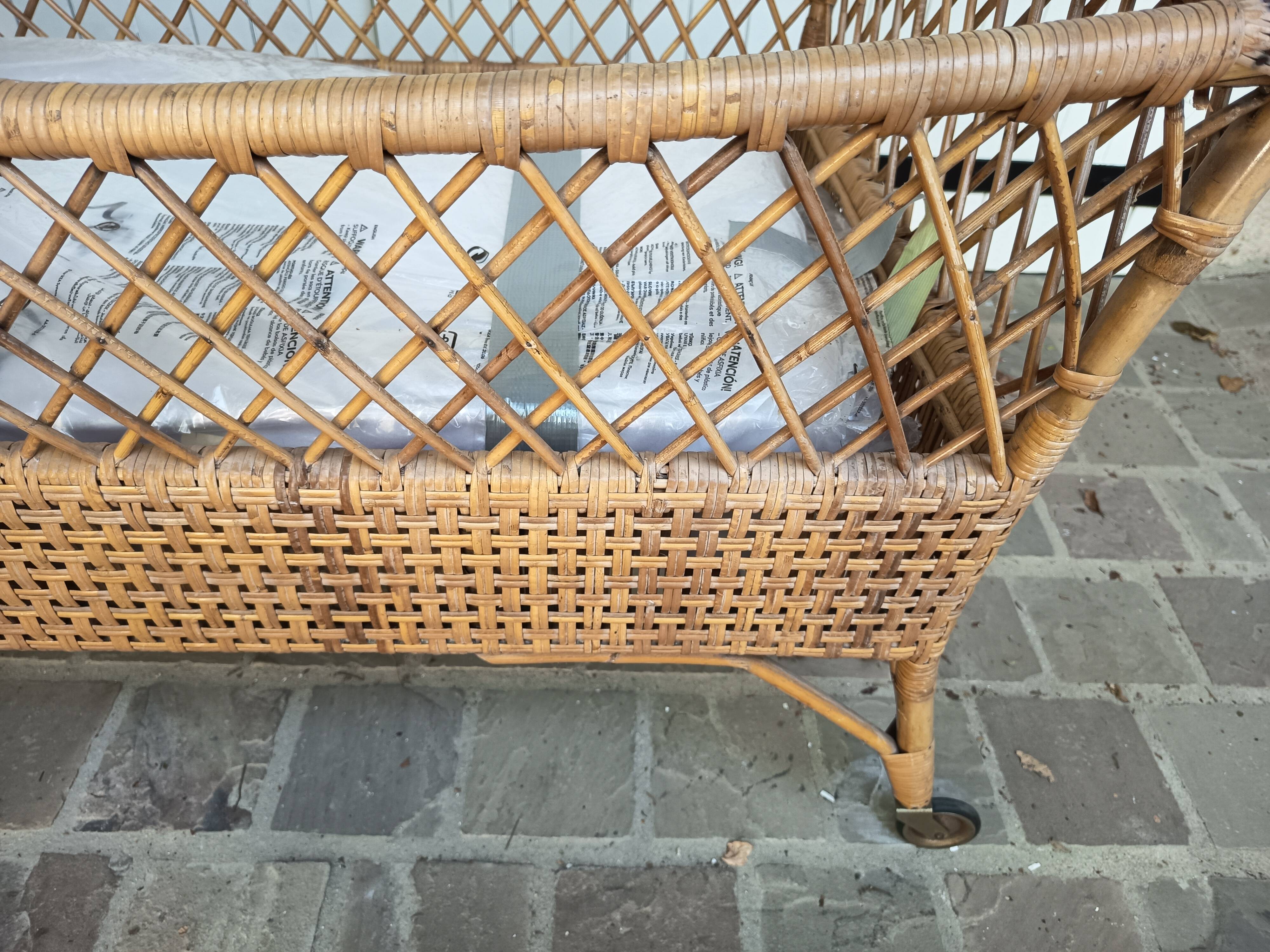 Vintage rattan cradle