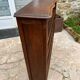 Bibus bookcase in carved wood