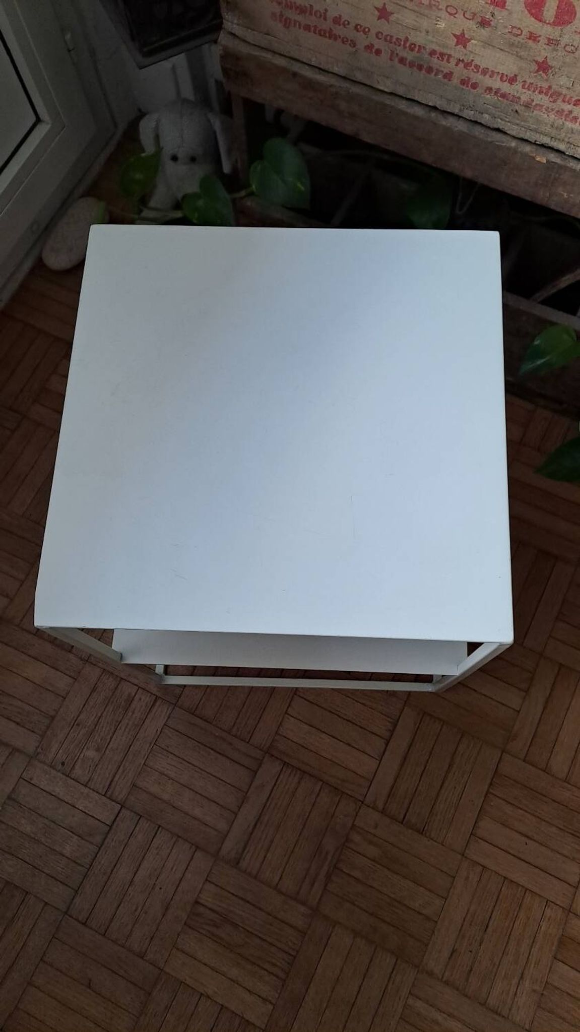 Metal coffee table with two levels.