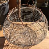 Old egg basket in metal shape round metal handle
