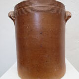 Old butter jug in flaming sandies