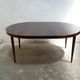 Vintage rosewood extendable Scandinavian round table by Kai Kristiansen for Skovmand and Anders