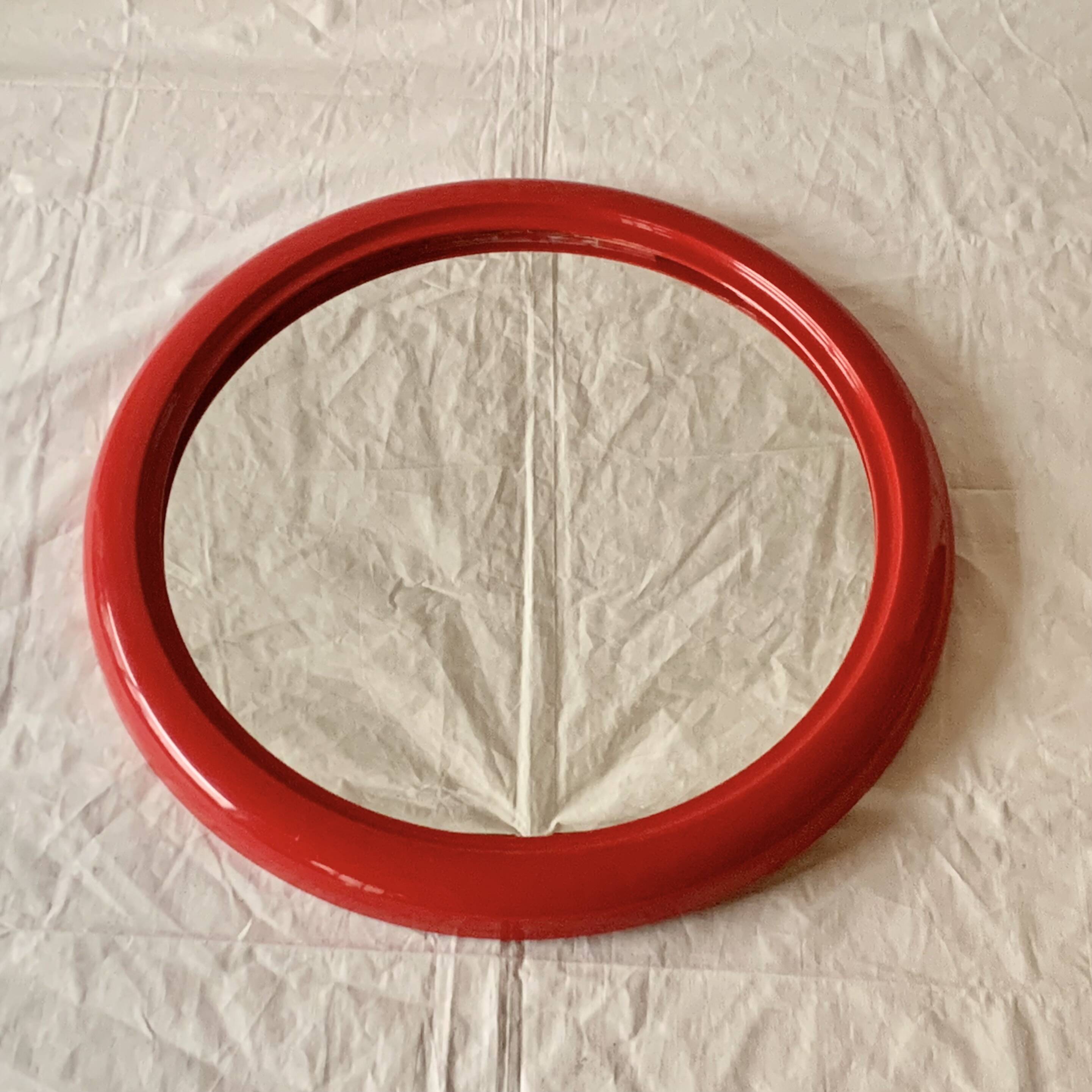 Vintage round red plastic mirror