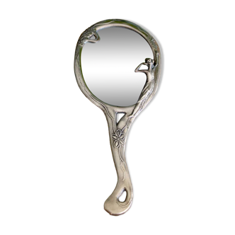 Statuette hand mirror