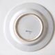 Decorative blue and white earthenware plate