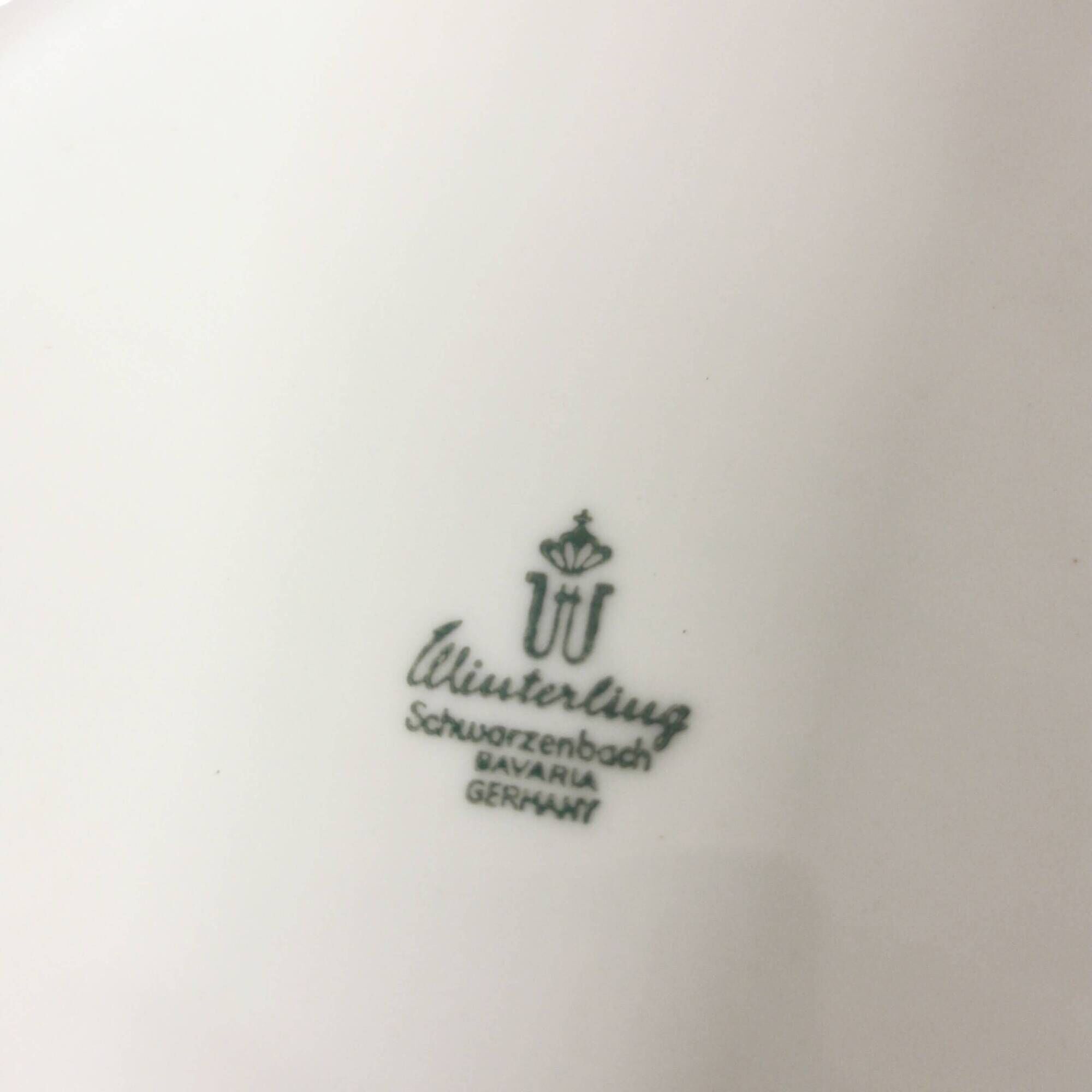 Shallow porcelain dish by Winterling with floral decoration.