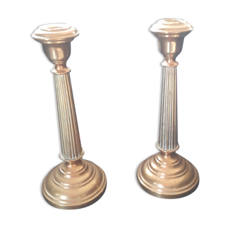 Pair of old candle holders made of thick brass;