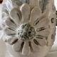 Pair of white glazed stoneware lamp bases, 20th-century floral decoration.