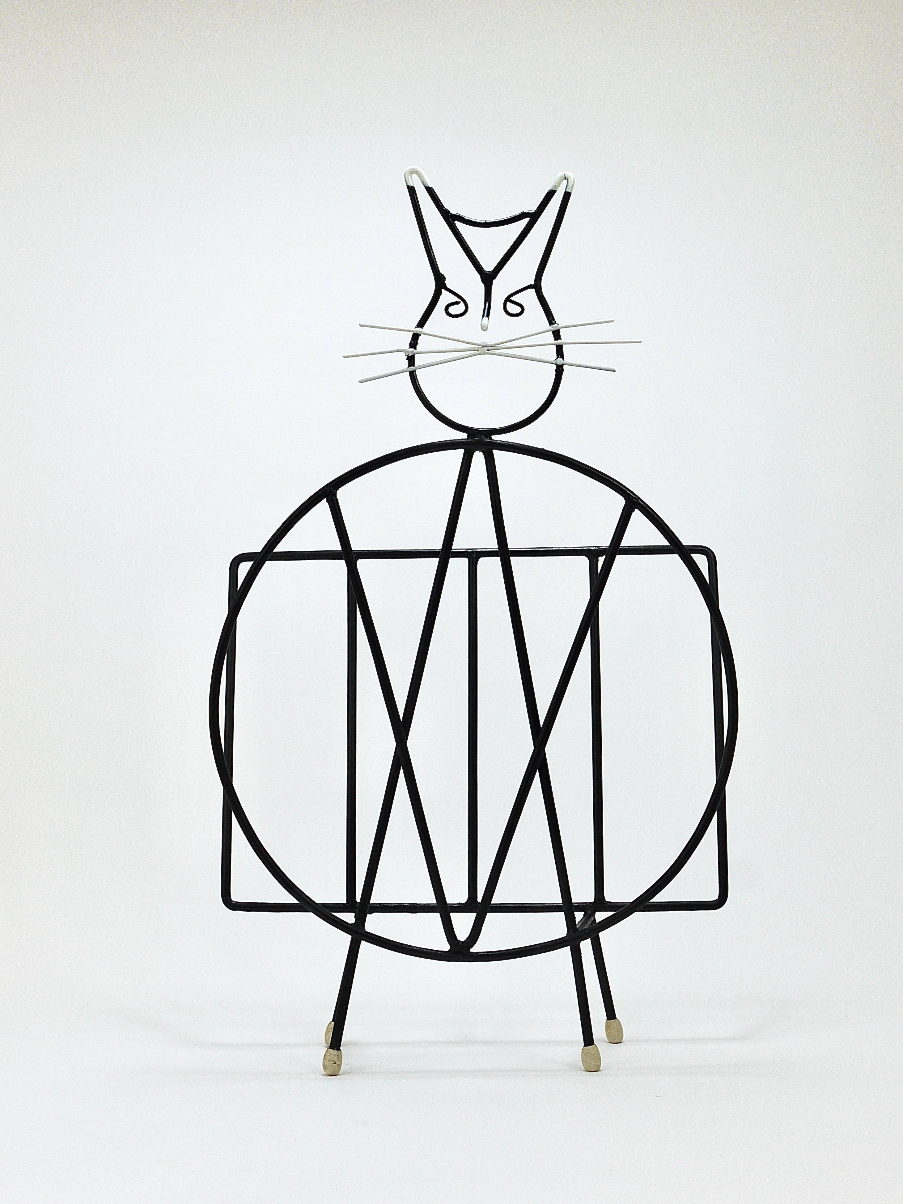 Mid-century cat-shaped magazine or record holder, iron, Italy, 1950s.