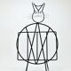Mid-century cat-shaped magazine or record holder, iron, Italy, 1950s.