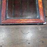 Old mirror frame in painted plaster